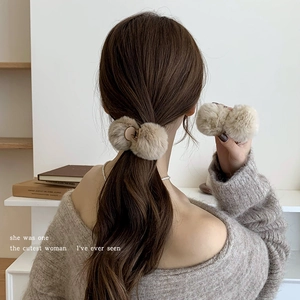 Maillard style beige plush hair claw clip featuring cute double balls for autumn and winter
