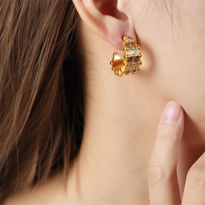 Golden C-shaped earrings with colorful glaze geometric patterns in a retro baroque style