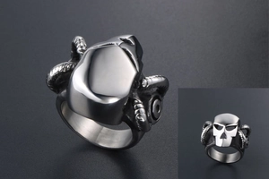 Macro view of mechanical sheep horn ring with industrial steel mask details