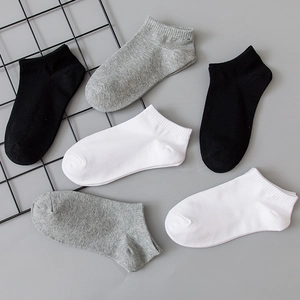 Classic low-cut cotton blend invisible boat socks in black, white, and grey solid colors