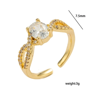 Golden bow adjustable ring with oval main diamond and pave zircons on white background