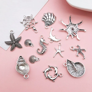Macro view of assorted tibetan silver sea life pendants for DIY jewelry making and crafts