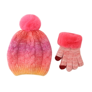 Detail showing gradient pink and purple knit hat with pompom and touchscreen gloves