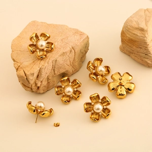 Vintage gold flower earrings with pearl center and textured petals for elegant women