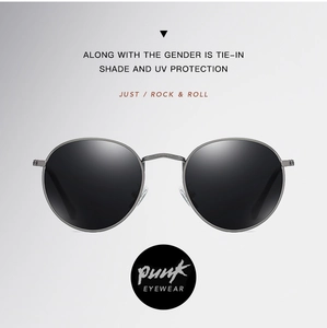 Close-up of retro round polarized sunglasses with gunmetal frame and UV protection