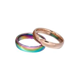 Polished rainbow and rose gold 4mm titanium steel rings in a minimalist band design