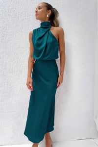 Close-up of elegant dark teal satin maxi dress featuring a high halter neckline design