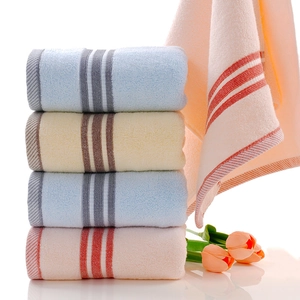 Absorbent pure cotton towels in pastel colors for facial use and home bathroom decor