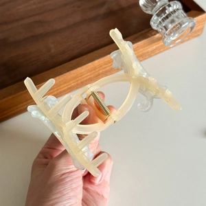 Translucent shark hair claw clip for women made of durable resin with strong metal spring