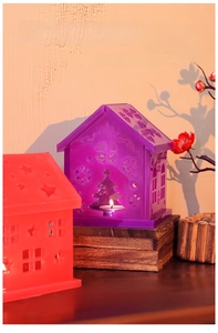 Detail of silicone house mold with Christmas tree and snowflake patterns for DIY resin crafts