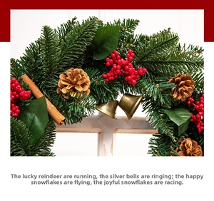 Close-up of Christmas wall tree with pine needles, red berries, cones and gold bells