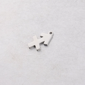 Detailed close-up of 15mm mirror-polished stainless steel Sagittarius zodiac charm with top hole