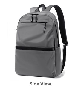 Side view of large grey business laptop backpack with waterproof nylon fabric and breathable straps