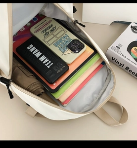 Top view of large nylon backpack interior showing multi-compartment storage capacity