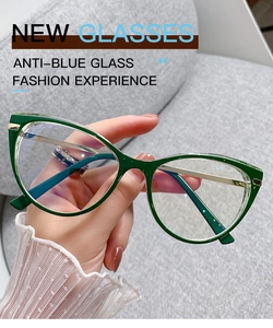 Close-up of retro green TR90 cat eye frames with gold metal temples and anti-blue light lens
