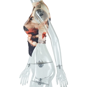 Side view of sleeveless top with angel print, irregular hem and side drawstring details