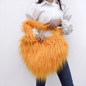 Furry heart-shaped orange crossbody bag in soft faux fur for women casual fashion