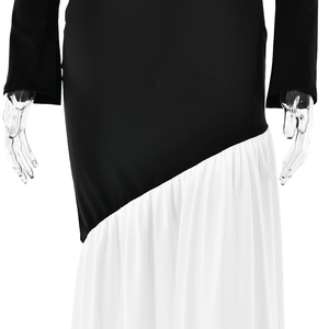 Detailed shot of the diagonal black and white color block stitching on the long dress