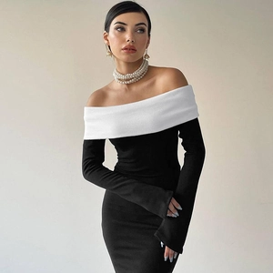 Detail of French style black and white off-shoulder long sleeve slim fit maxi dress