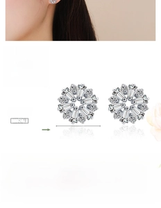 Close-up of 9.5mm S925 sterling silver flower stud earrings with cubic zirconia
