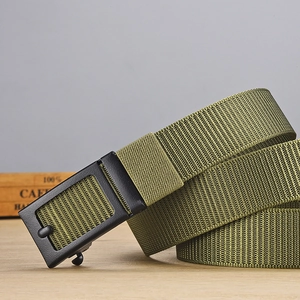 Close-up of olive green tactical nylon belt with matte black metal buckle detail