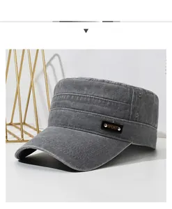 Detail of dark grey washed cotton flat top army cap with SPORT side patch and stitched brim
