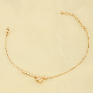 Elegant 18K gold plated titanium steel bracelet featuring a delicate rose flower pendant