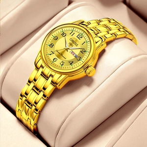 Montre quartz luxe pour femme en or avec index diamants et calendrier sur coussin