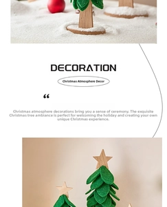 Close-up of a felt green Christmas tree with a wooden base and red holiday ornaments