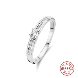 Detailed macro view of 925 sterling silver bridal ring with round diamond and channel setting