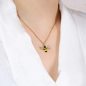 Exquisite gold bee pendant necklace with yellow enamel and white crystals for women
