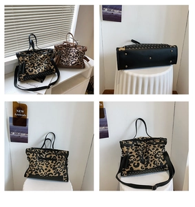 Detail view of leopard print tote bag showing bottom rivets and stylish fringe tassel