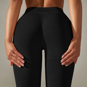 Rear view of black seamless high-waist yoga pants with scrunch butt lifting effect