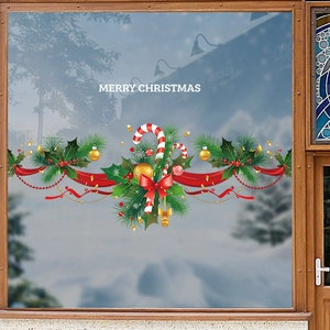 Christmas window sticker with candy cane wreath and Merry Christmas text on glass