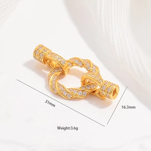 Macro view of gold S925 silver clasp with zircons measuring 31mm length and 3.6g weight