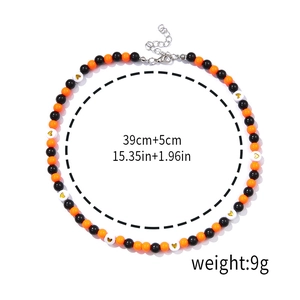 Detailed view of beaded Christmas necklace with lobster clasp showing 39cm+5cm dimensions