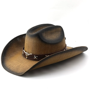 Vintage western cowboy hat with woven straw texture and metal bull head ornament on leather band