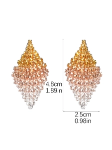 Detail view of geometric rhinestone drop earrings with dimensions 4.8cm by 2.5cm