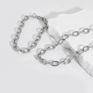 Set collana e bracciale a catena d'argento con maglie a trama mista minimalista