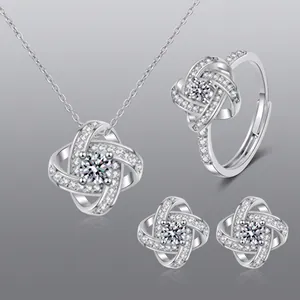 Silver infinity knot jewelry set with necklace earrings and adjustable ring for women