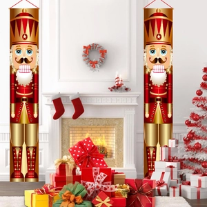 Christmas nutcracker soldier door banners hanging next to a cozy fireplace setup