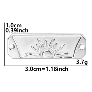 Macro view of sun engraved stainless steel pendant showing dimensions and size details