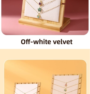 Detail of cream white velvet necklace display board with bamboo base and multi-slots