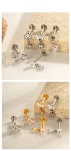 Detailed macro of flat back titanium stud earrings with marquise cut cubic zirconia
