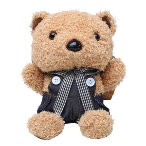 Cute brown plush teddy bear messenger bag with denim overalls and checkered bowtie