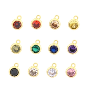 Set of 12 colorful round cubic zirconia birthstone charms with gold plated bezels