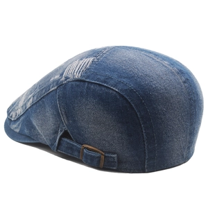 Distressed dark blue denim beret hat with fringe details and adjustable copper buckle