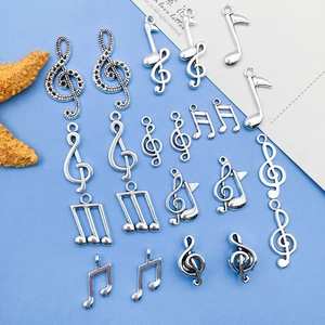 Detailed assortment of silver music note alloy pendants for DIY jewelry making and crafts
