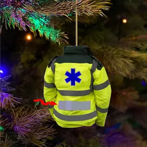 Flat acrylic EMS jacket ornament with Star of Life logo hanging on a Christmas tree