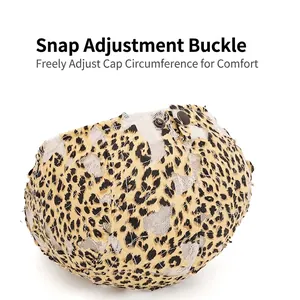 Leopard print newsboy cap with adjustable bronze metal buckle for custom comfort fit